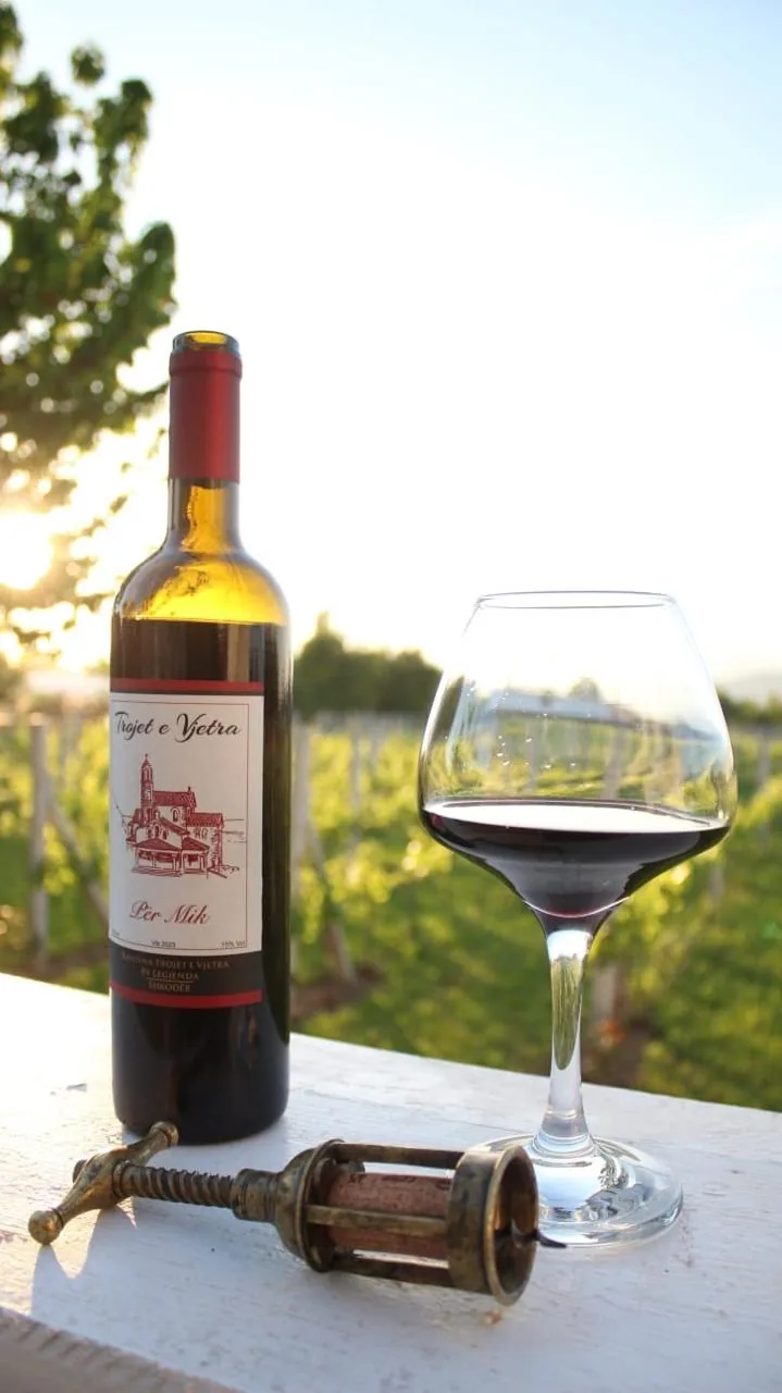 Wine bottle and glass